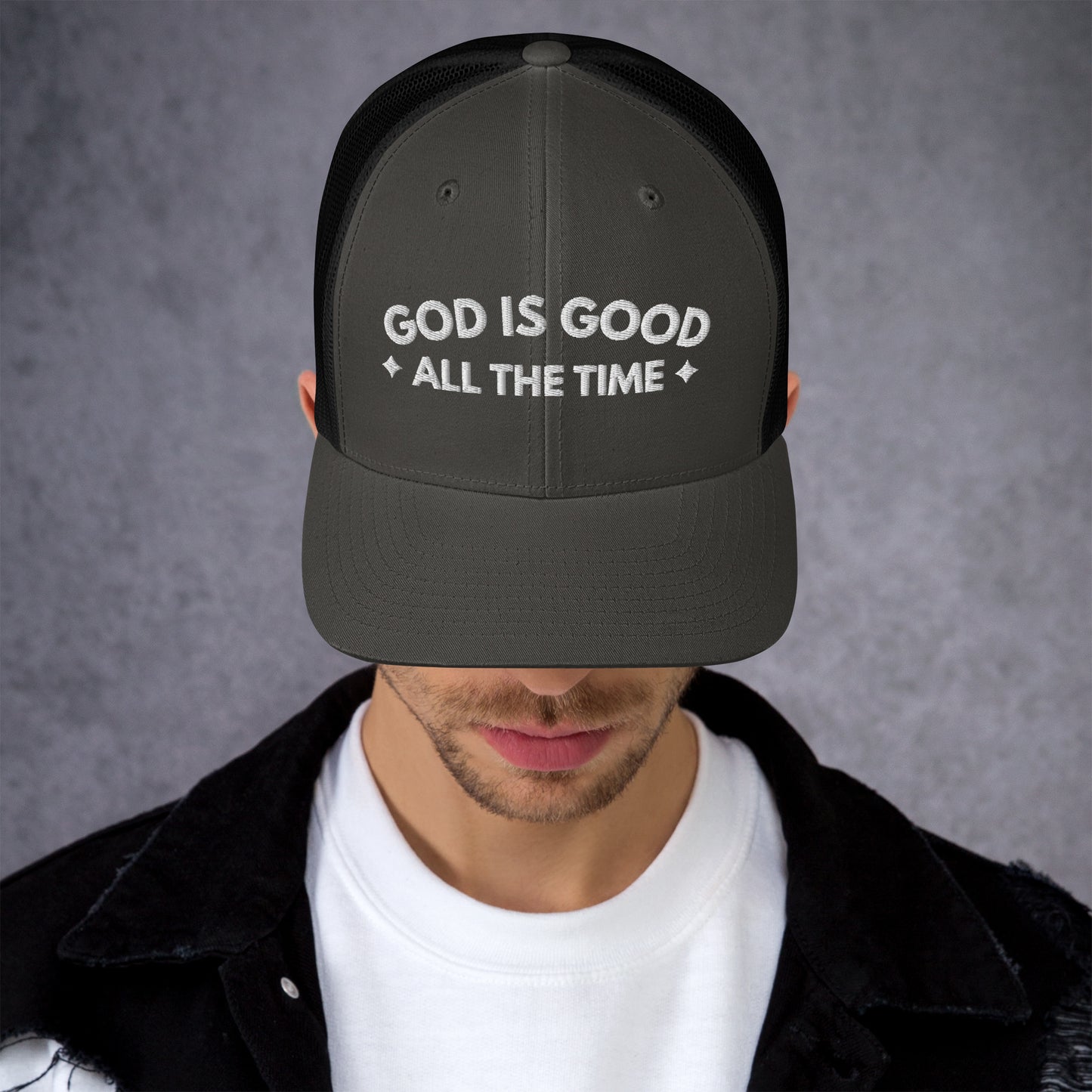 Charcoal grey Christian trucker hat with GOD IS GOOD ALL THE TIME design on front panel