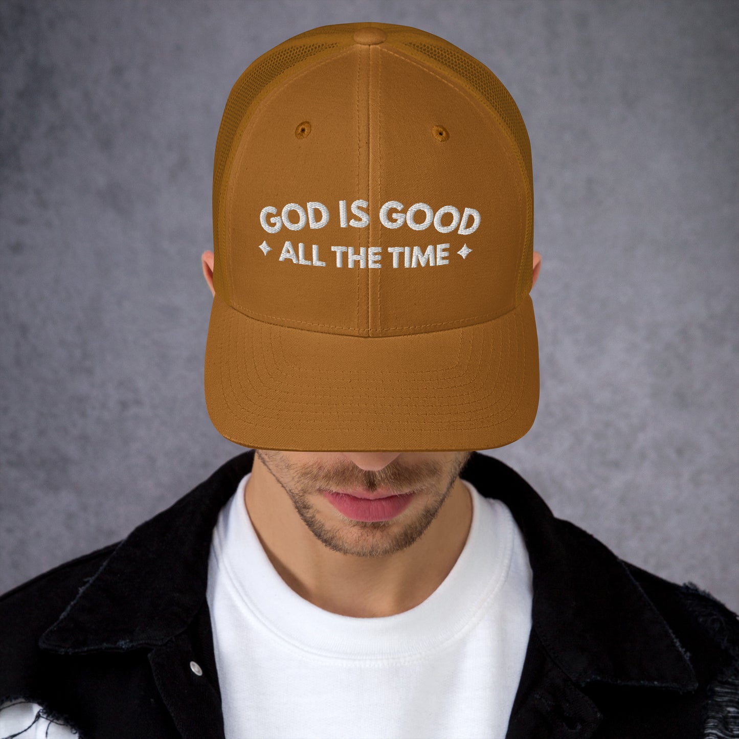 Christian trucker hat in gold with GOD IS GOOD ALL THE TIME embroidered in white