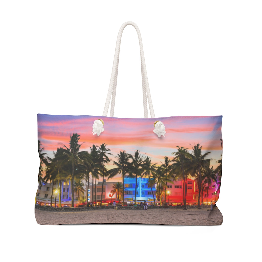 Oversized Miami Vice beach bag with neon retro-style design and rope handles, displayed upright.