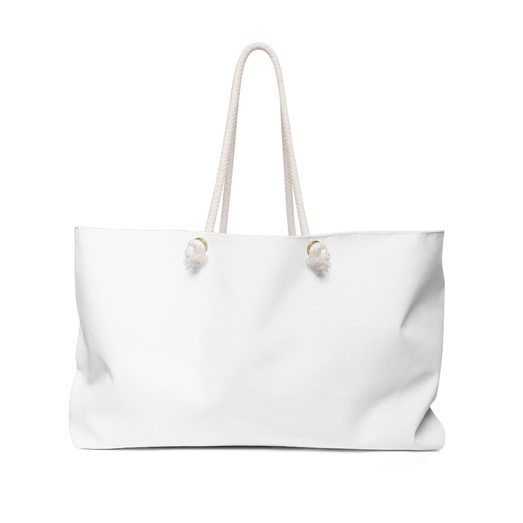 Oversized all-white beach bag with thick rope handles, shown upright against a white background.