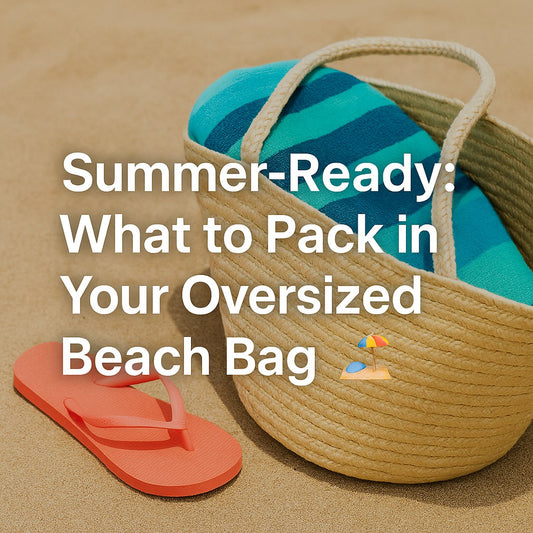 Oversized beach bag on the sand with summer essentials including a towel, sunglasses, sunscreen, and flip-flops, under bright sun with blog title overlay.