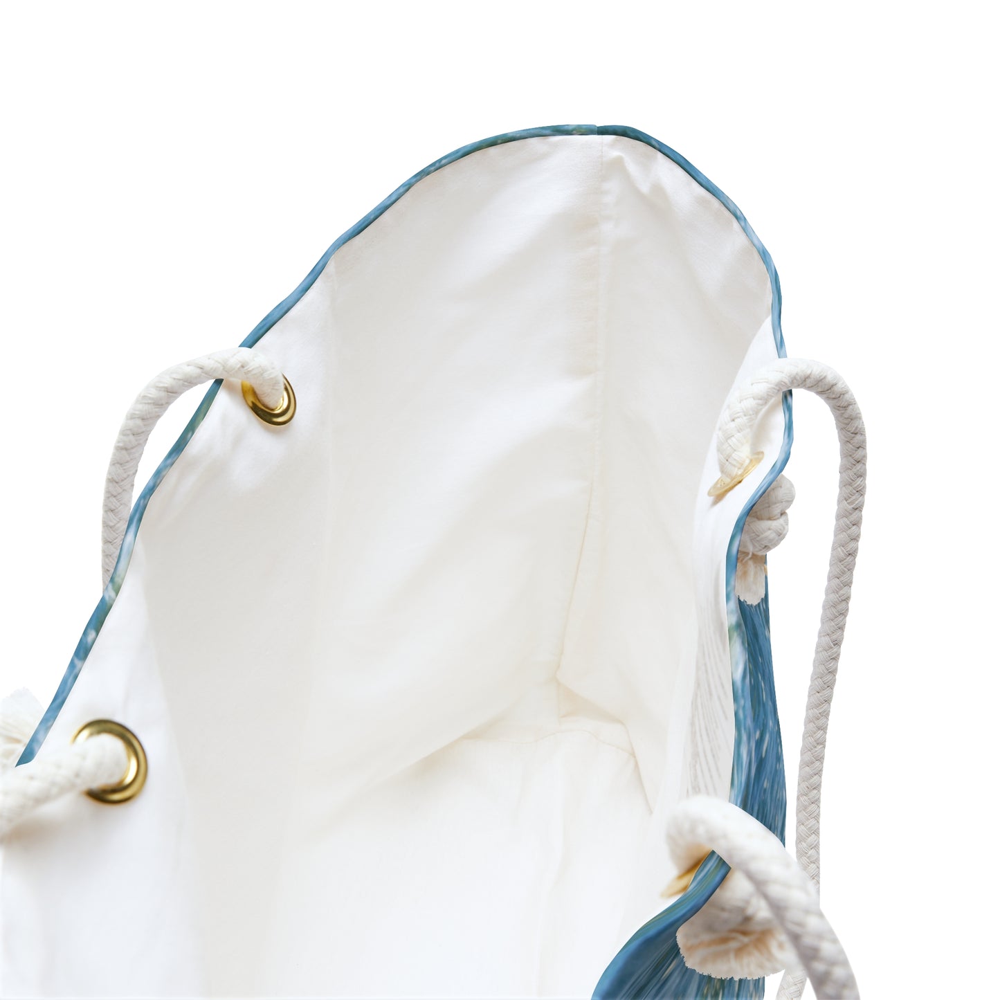Close-up of Dalmatian beach bag’s cream rope handles and thick fabric texture.