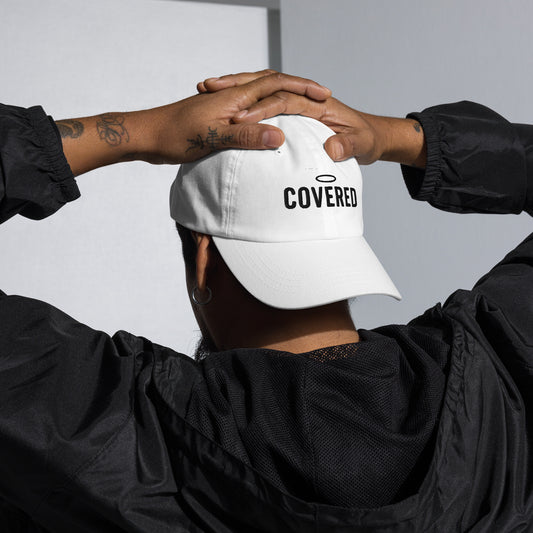 Back view of man wearing white dad hat with Christian COVERED Dad Hat with halo embroidery
