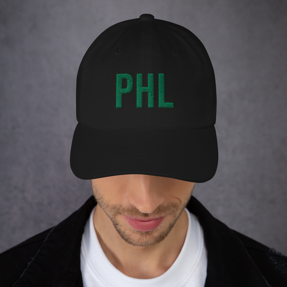 Man wearing PHL Script Sports Hat - Black Front