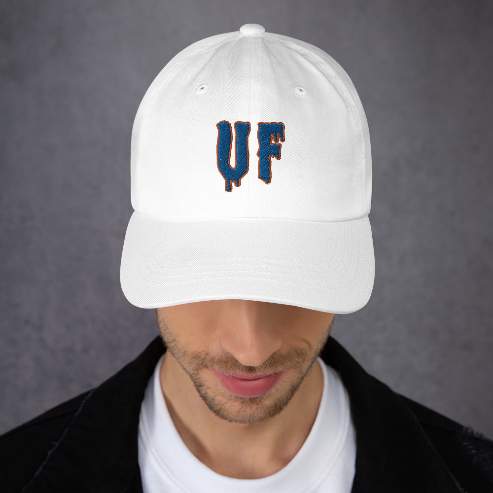 Man wearing UF Ooze Hat - White