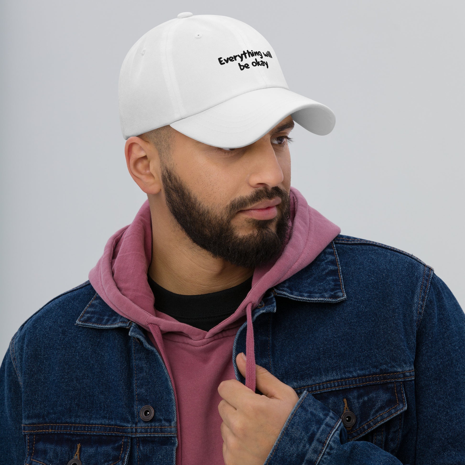 Man wearing Everything Will Be Okay Hat - White